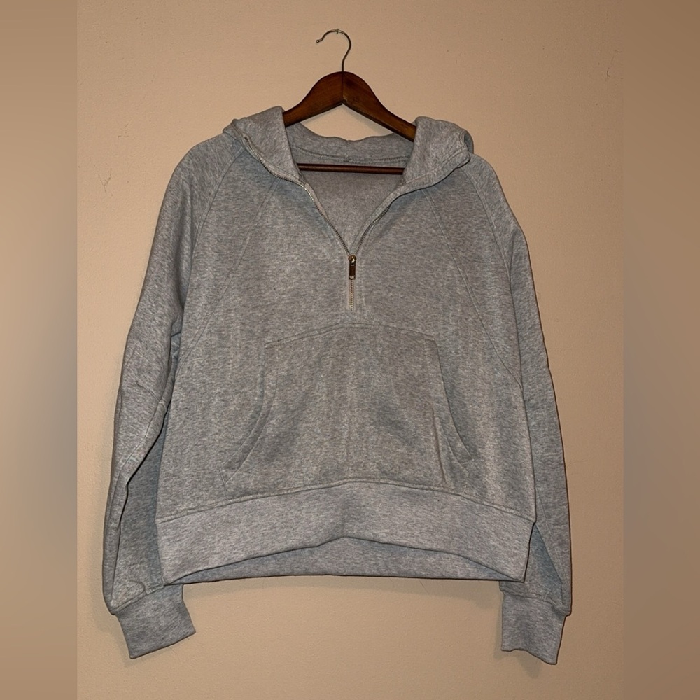 Gray hooded halfzip jacket with ribbing and hood